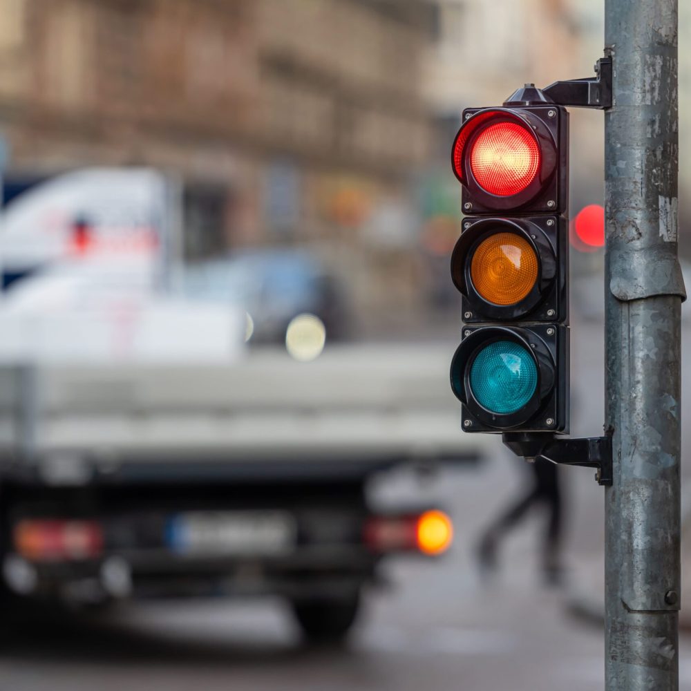 view-of-city-traffic-with-traffic-lights-in-the-f-2023-11-27-05-29-48-utc-min view-of-city-traffic-with-traffic-lights-in-the-f-2023-11-27-05-29-48-utc-min